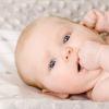 Teach mom to recognize hunger cues like when baby brings her hands to her mouth.