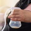 Teach mom how to express breastmilk with breast pumps
